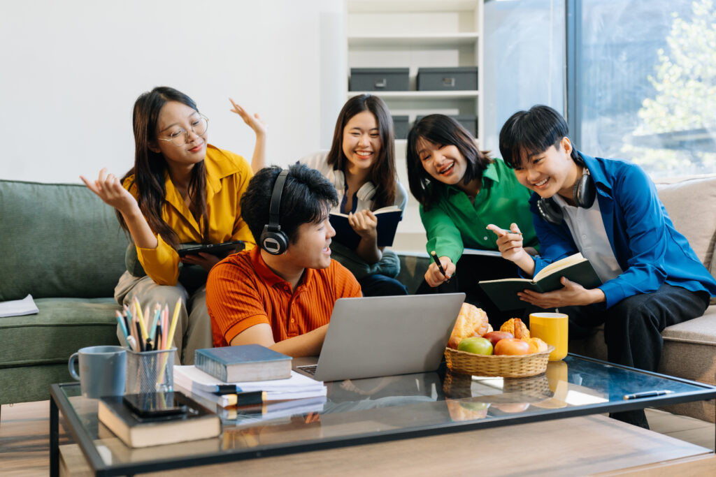 Happy group of college students excited overjoyed